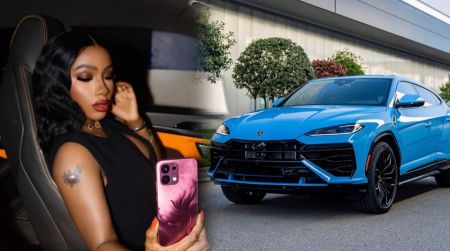 BBNaija star Mercy Eke poses inside a luxury car while a bright blue Lamborghini Urus is parked outside.