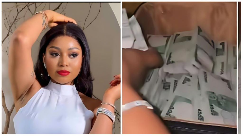 Actress Regina Daniels is seen posing elegantly in a white sleeveless outfit with bright red lipstick and minimal jewelry. In the accompanying frame, bundles of ₦1000 notes are shown stacked inside a suitcase, suggesting a lavish display of cash from a recent splurge or gift reveal.
