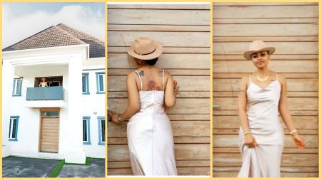 Regina Daniels poses in front of a modern white duplex with blue window frames and a wide wooden door. She wears a cream satin dress and a beige hat in different shots—one showing her on the balcony, another revealing her back tattoos, and a third with her facing the camera.
