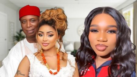 Businessman Ned Nwoko poses with actress Regina Daniels, both dressed in white traditional attire, alongside entrepreneur Sandra Iheuwa in a red-and-blue outfit, all photographed indoors.