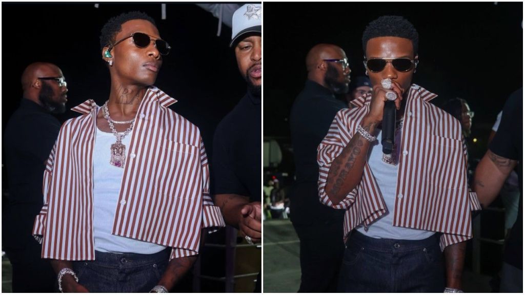 Nigerian music star Wizkid spotted at a night event wearing a stylish brown-and-white striped shirt over a white tank top, accessorised with sunglasses and layered jewellery, as he interacts with the crowd and performs on stage.