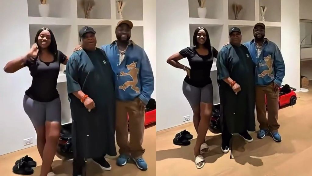 Governor Ademola Adeleke stands between Chioma and Davido inside a modern living room. Chioma poses smiling on one side, while Davido stands on the other, dressed casually and smiling. The three appear relaxed as they pose for photos during the governor’s visit.