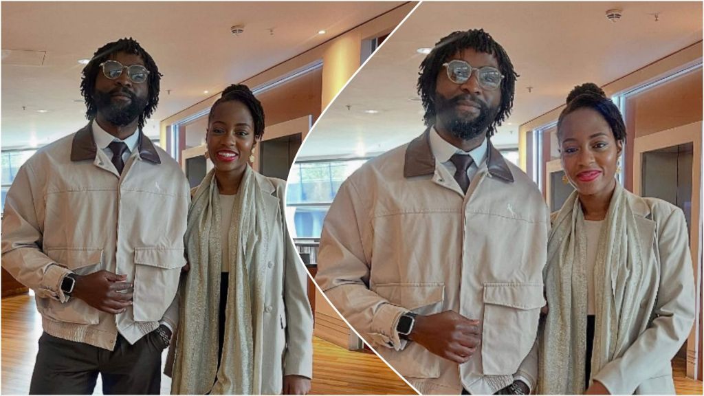 Khafi and Gedoni pose together indoors, both dressed in coordinated neutral-toned outfits, smiling for the camera.