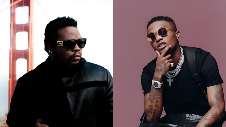 Side-by-side photo of Nigerian artists Olamide and Wizkid; Olamide wears dark sunglasses and a black leather jacket with the Golden Gate Bridge blurred behind him, while Wizkid poses in a black outfit with layered chains, sunglasses, and tattoos against a plain studio background.