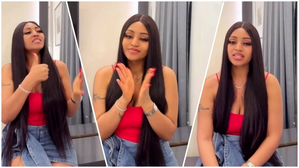 Three-photo collage of Regina Daniels sitting indoors, wearing a red top and denim skirt, gesturing and speaking to the camera with long straight hair and neutral background.