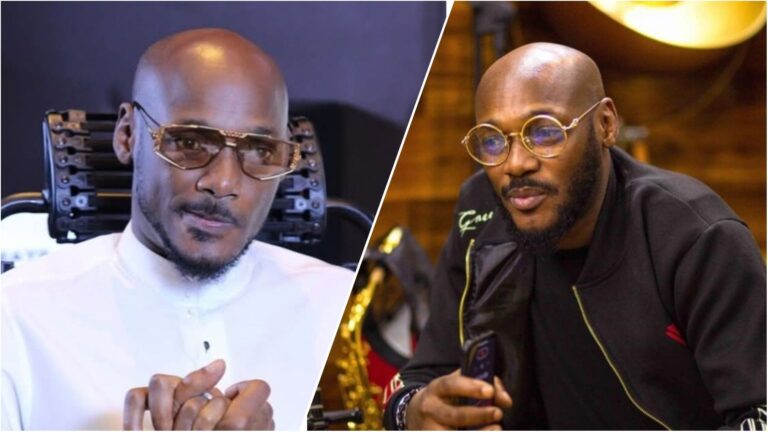 Side-by-side photos of Nigerian singer 2Baba wearing glasses, with one image showing him in a white outfit and the other in a black jacket while holding a phone.