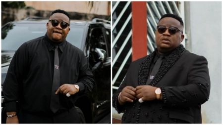 Two side-by-side photos of Cubana Chief Priest wearing black outfits and sunglasses, posing outdoors beside vehicles and buildings.