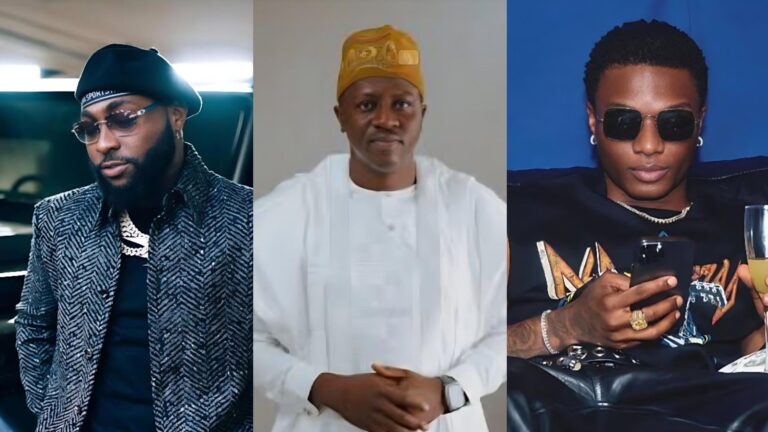 Davido standing beside a car in a patterned jacket, Jubril A. Gawat in traditional white attire and cap at the centre, and Wizkid seated on the right wearing sunglasses while looking at his phone.