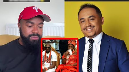 A bearded man wearing a red baseball cap sits on the left, looking down, while a smiling man in a blue suit and polka-dot tie appears on the right; between them is a small inset photo of 2Baba and his wife dressed in traditional red Edo attire during a ceremony.