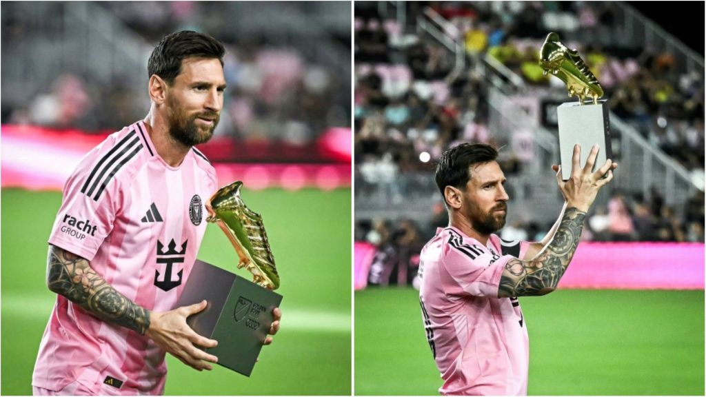 Lionel Messi wearing a pink Inter Miami jersey, holding and raising the MLS Golden Boot-style MVP trophy on the pitch during a post-match ceremony.