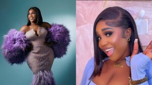 A full-body portrait of influencer Nons Minaj wearing a fitted lilac lace gown with dramatic purple feather sleeves and hem, posing confidently against a teal studio backdrop.