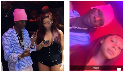 Split-image collage featuring Nigerian singer Seyi Vibez and his rumored partner Skyla—left: both standing close in a dimly lit club setting, Seyi in a pink beanie, blue-and-white striped shirt, and multiple chains while looking at her phone, Skyla in a black corset top and shorts holding her phone; right: intimate selfie of the two lying down under red-purple lighting with "Bestie" text and heart emoji overlay.