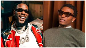 A split image featuring Nigerian Afrobeat superstars Burna Boy and Wizkid. On the left, Burna Boy is smiling, wearing dark sunglasses, heavy diamond chains, and a red, white, and black racing-style leather jacket. On the right, Wizkid is wearing dark sunglasses and a grey sweater, looking off to the side.