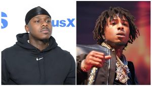 A side-by-side composite photograph featuring American rappers DaBaby (left) and NBA YoungBoy (right). On the left, DaBaby is shown from the chest up, wearing a black hoodie and a black durag while appearing to speak into a microphone. On the right, NBA YoungBoy is depicted performing on stage with his signature dreadlocks, wearing multiple diamond-encrusted chains and holding a microphone.