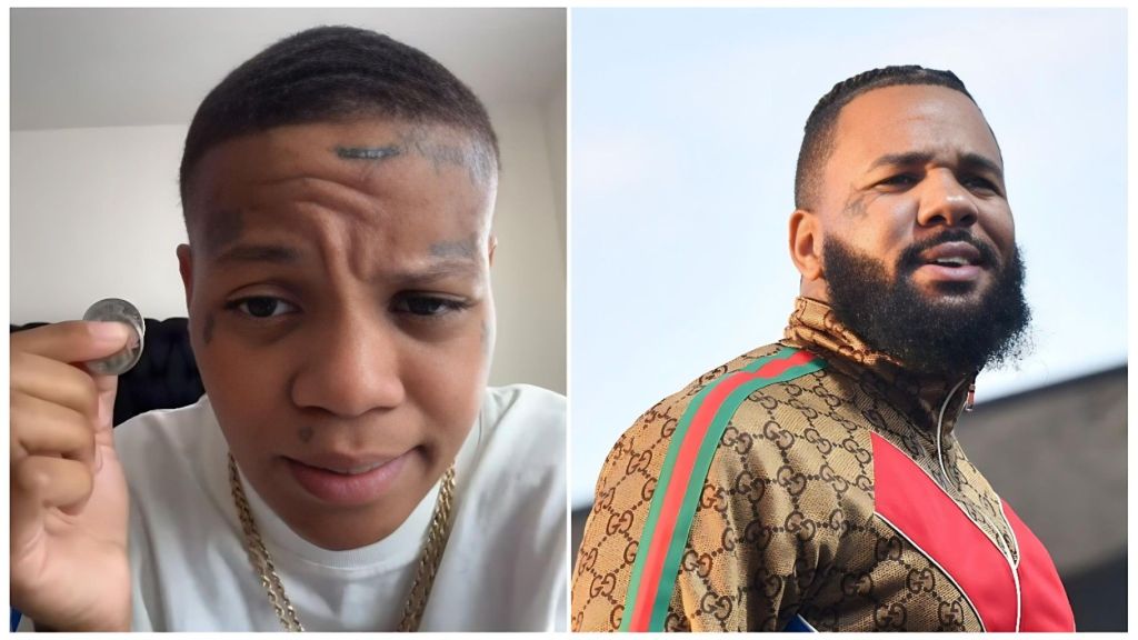 A split-screen image featuring Victoria Woods (also known as ScarFace Woodz) on the left and the rapper The Game on the right. Victoria Woods is seen in a close-up selfie-style shot, looking into the camera with a serious expression while holding a small coin between her fingers. On the right, The Game is pictured from a low angle, wearing a patterned Gucci tracksuit and looking off-camera with a contemplative expression.